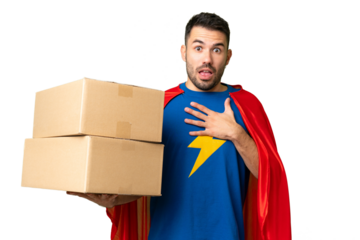 Super Hero delivery caucasian man over isolated chroma key background surprised and shocked while looking right