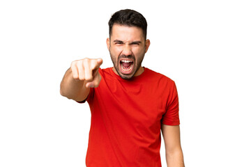 Fototapeta premium Young handsome caucasian man over isolated chroma key background frustrated and pointing to the front