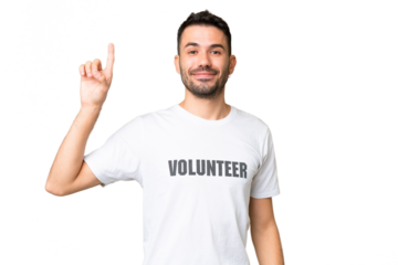Young volunteer caucasian man over isolated chroma key background pointing up a great idea