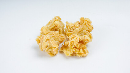 Homemade Fried Chicken Bites or fried popcorn chicken isolated on white background