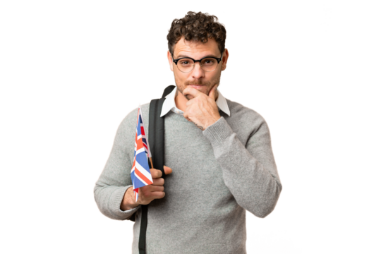 Brazilian man holding an United Kingdom flag over isolated chroma key background thinking