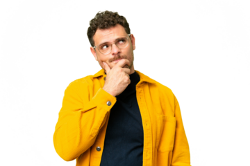 Brazilian man over isolated chroma key background having doubts and with confuse face expression