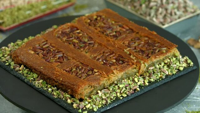 Traditional turkish baklava pistachio pastry. Dilberdudagi, ozel kesim baklava, cikolatali baklava, fistikli baklava, katmer, fistikli kadayif, kattafi, fistik sarma, soguk baklava, midye baklava, cev