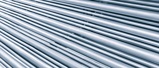 Row of metal pipes in chemical production, geometric linear shap pattern, technology industry...