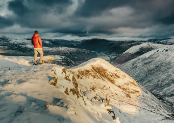 Hiker in the Mountains in Winter