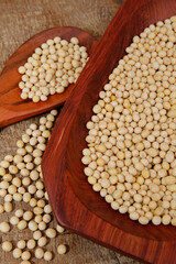 Soya beans closeup on wooden platter. Brazil