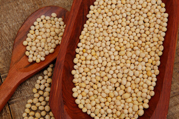 Soya beans closeup on wooden platter. Brazil
