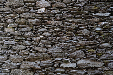 Natural rock wall background. Stone or brick wall texture.