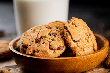 Homemade cookies with chocolate. Against a dark background
