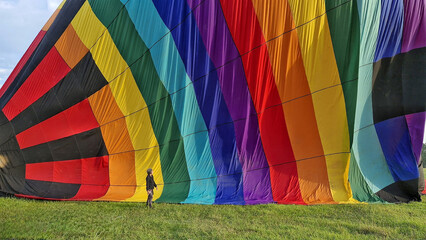 Pleasant walk beside your colorful hot air balloon after traveling in it
