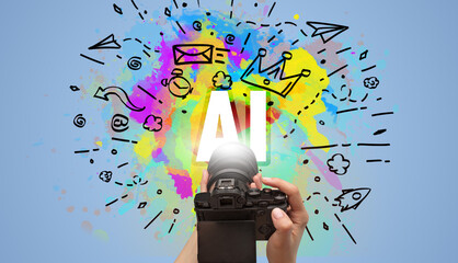 Close-up of a hand holding digital camera with abstract drawing