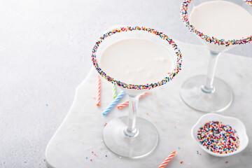 Birthday cake martini with sprinkles on rim