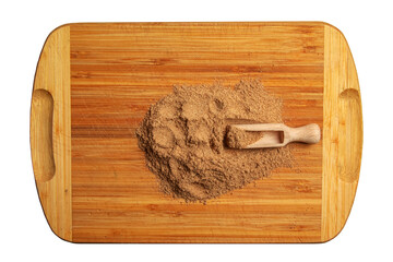 Aromatic fragrant organic spice from cumin powder, on a wooden cutting board in a wooden spoon.
