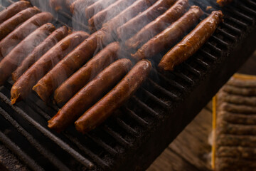 Close-Up of Grilled Sausage-Stuffed Pastries on a Hot Grill