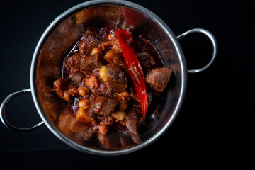 Spiced Cubed Beef with Chili Peppers and Rustic Hummus