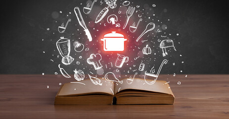 Open recipe book with food related icons above