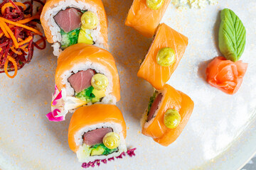 Fresh salmon sushi, a delight of flavors and textures, salmon sushi cut into ten parts