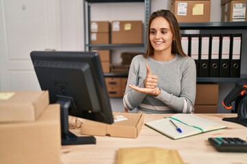 Young blonde woman ecommerce business worker having online deaf language conversation at office