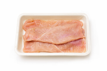 tray with turkey steaks. isolated white background