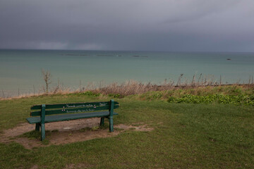 bench on top of cliff at Gold Beach, Normandy, France, Site of D-Day. 