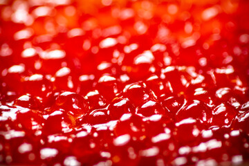 Grains of delicious red caviar. Macro background. 