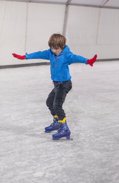 Children enjoy skating on ice