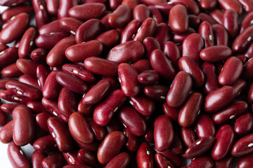 Macro Close up Texture of red bean, red grain beans. Beautiful complete seed pea bean, food object design. Selective focus freeze shot black background isolated