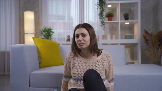 The mentally ill young woman becomes paranoid, flees from the camera in fear and panic. 
The camera shutters and scares the paranoid and schizophrenic woman.
