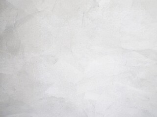Pattern of gray cement wall in room.