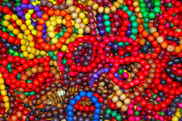 Close-up wooden colourful handmade bracelets