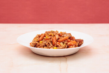 Rice with sauce and vegetables