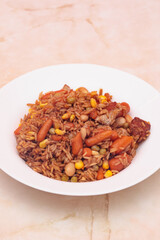 Rice with sauce and vegetables