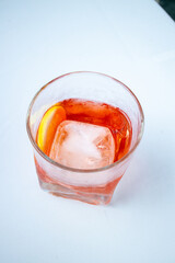 Classic Italian Negroni cocktail on a white table