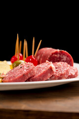 Picada with a variety of cheeses, meat and cherries