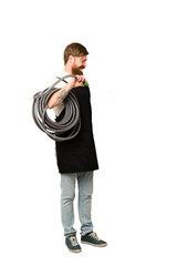 Adult gardener man holding a plant full body cut out isolated