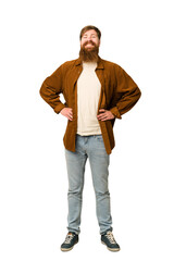 Naklejka premium Adult redhead man full body isolated