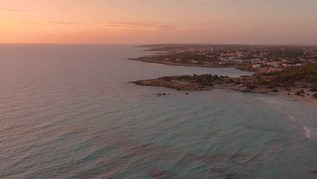 Salento - tramonto sulla spiaggia visto dal drone, Marina di Pulsano, Taranto, Puglia, Italy
