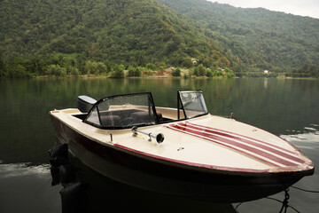 Beautiful boat on river and mountains in park