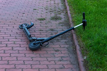 Abandoned transport. Abandoned scooter on the street