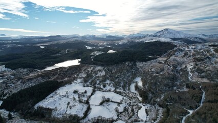Fototapeta na wymiar Snowdonia, Wales (UK), Winter 2023. Aerial landscapes of snow and mountains.