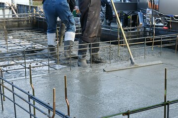 A view of a residential building construction site. The concrete placement work.