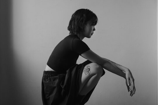 Portrait of asian young woman  with henna tattoo on legs