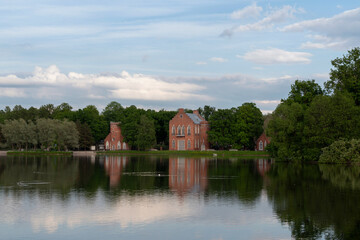 Obraz premium Architectural ensemble of the Admiralty on the shore of the Big Pond in the Catherine Park of Tsarskoye selo on a sunny summer day, Pushkin, St. Petersburg, Russia