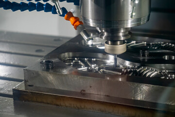 The CNC milling machine cutting footwear mold part by solid ball end mill tool.