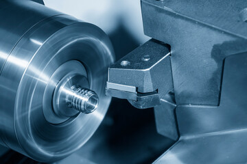 The multi-tasking CNC lathe machine  thread cutting the metal pipe parts. - obrazy, fototapety, plakaty