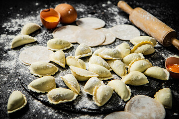 Cooking homemade dumplings with potatoes. 