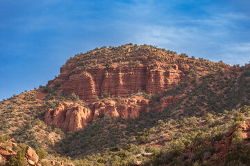 Grand red rock mountain side in rural New Mexico on clear day
