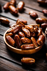 Ripe dates on a plate. 