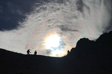 Fototapeta premium Mountaineers climbing on Aladaglar Mount Emler at silhouette in Nigde, Turkey. Aladaglar is most important mountain range in Turkey.