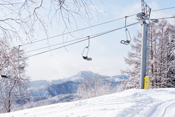 An empty chairlift at ski resort